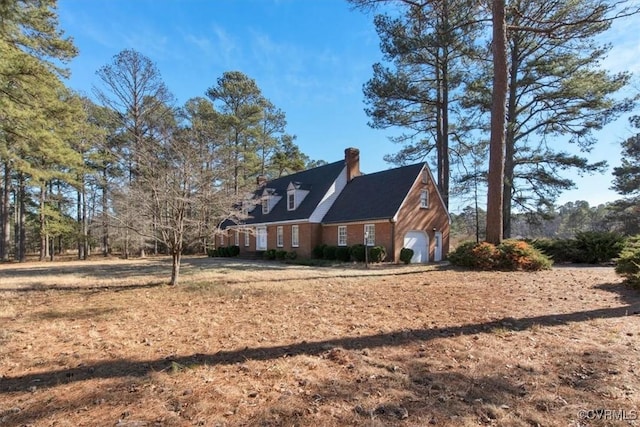 view of property exterior with a garage