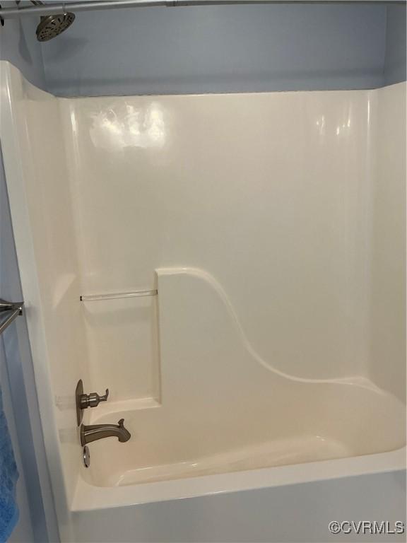 bathroom featuring shower / washtub combination