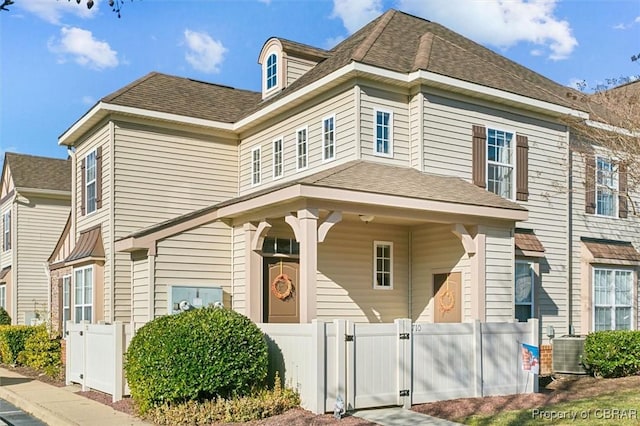 view of front of home with cooling unit