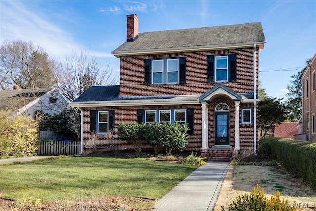 view of front of house with a front lawn