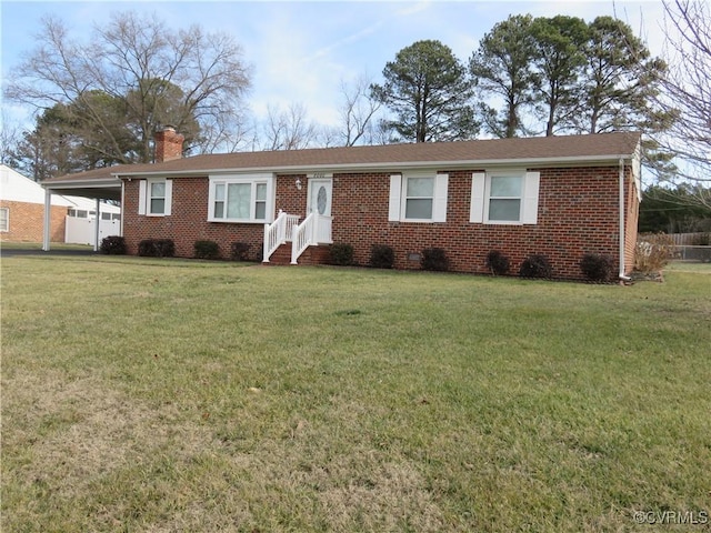 ranch-style home with a carport and a front yard