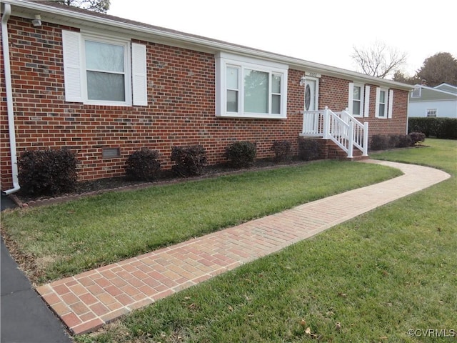 view of front of home with a front yard