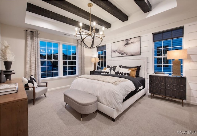 bedroom featuring a chandelier, beamed ceiling, and carpet flooring