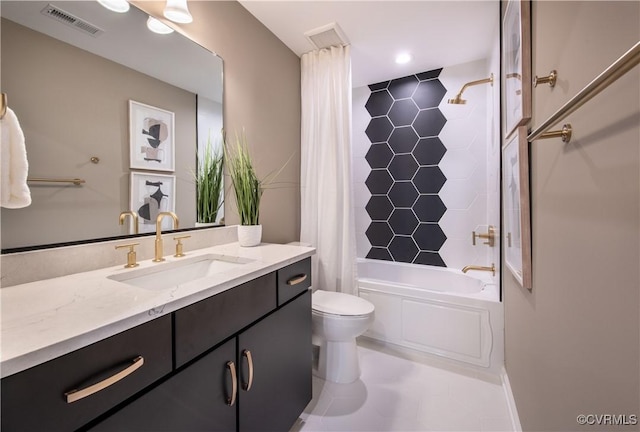 full bathroom featuring vanity, shower / tub combo, and toilet