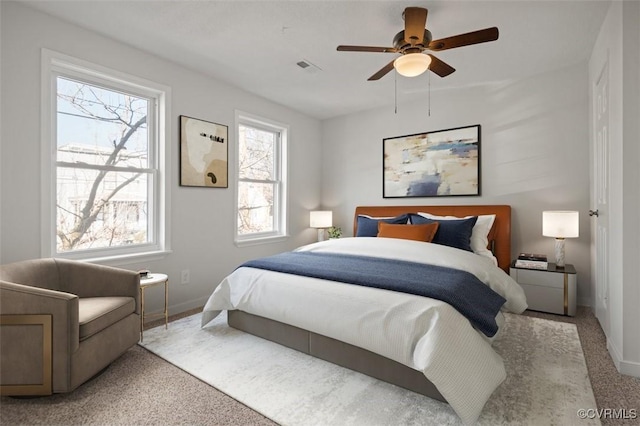 bedroom featuring visible vents, baseboards, and a ceiling fan