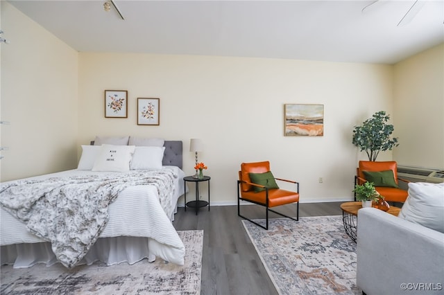 bedroom featuring dark hardwood / wood-style flooring