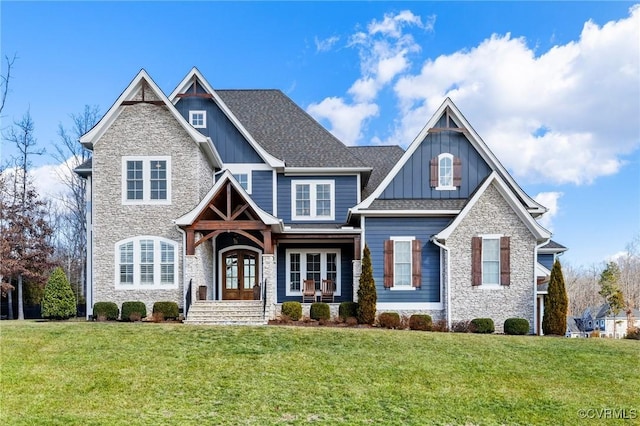 view of front of house featuring a porch and a front lawn