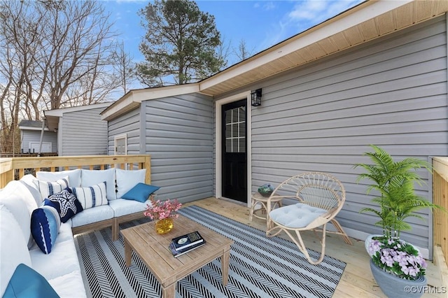 wooden deck featuring an outdoor hangout area