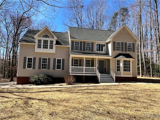 view of front of property featuring covered porch and crawl space