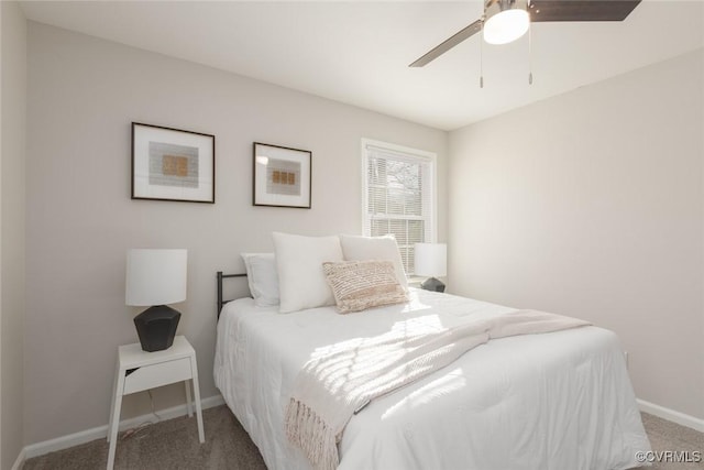 bedroom with ceiling fan and carpet