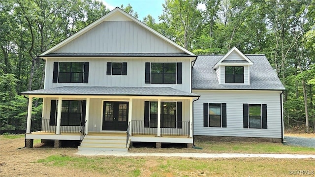 view of front of home featuring french doors and a porch