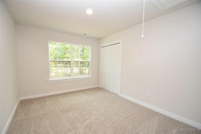 unfurnished room with carpet floors