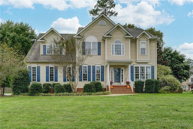 view of front of home with a front lawn