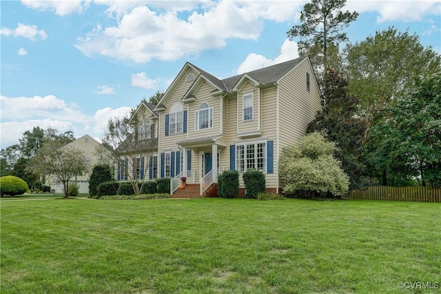 view of front of house with a front lawn