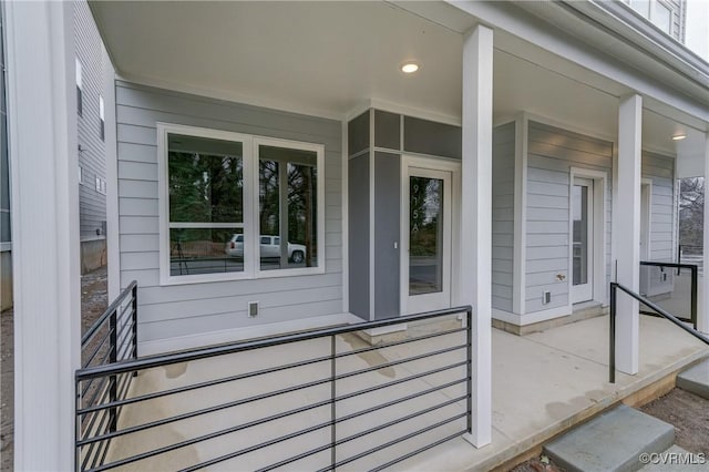 entrance to property with covered porch