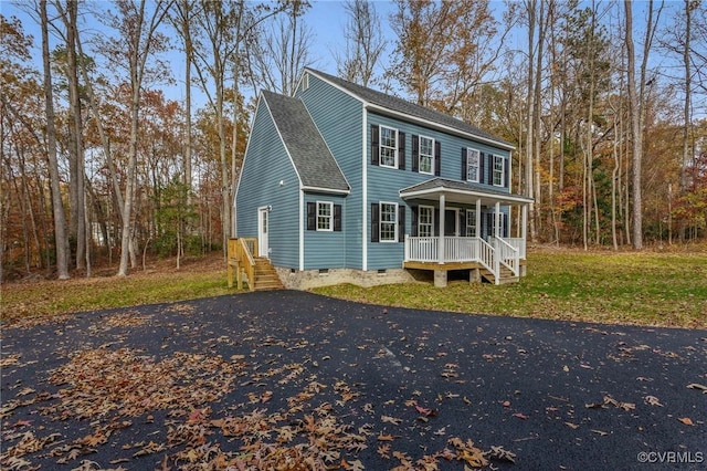 view of front of house with a front lawn and covered porch