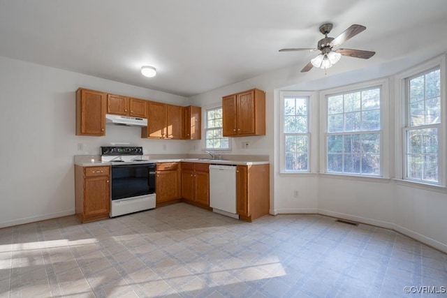 kitchen with ceiling fan, white appliances, and sink