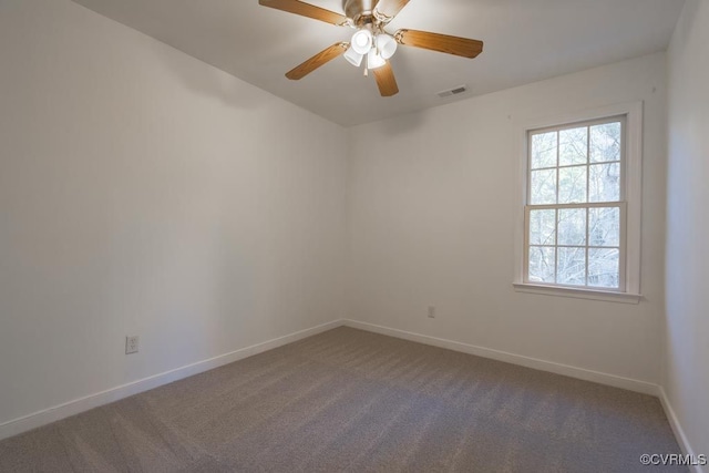 empty room with carpet floors and ceiling fan