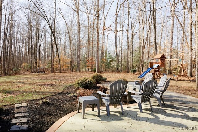 view of patio featuring a playground