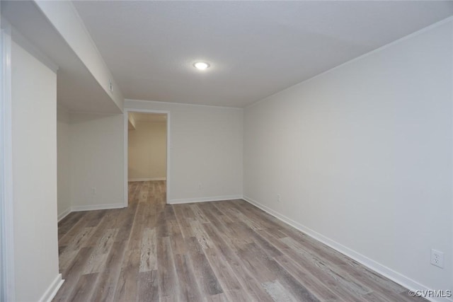 unfurnished room with light hardwood / wood-style floors