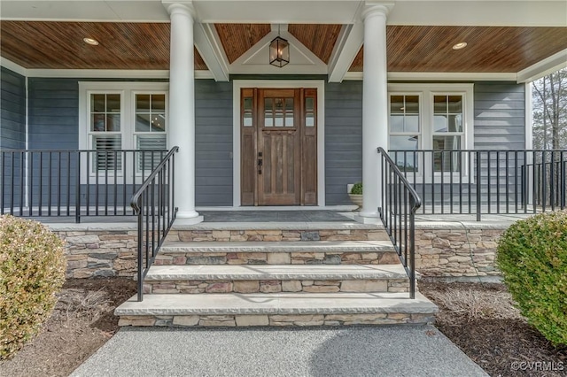 doorway to property with covered porch