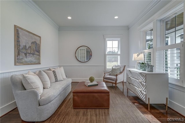 living room featuring ornamental molding and dark hardwood / wood-style flooring