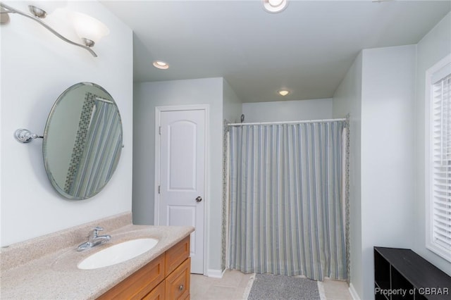 bathroom with tile patterned floors, vanity, baseboards, a shower with shower curtain, and recessed lighting