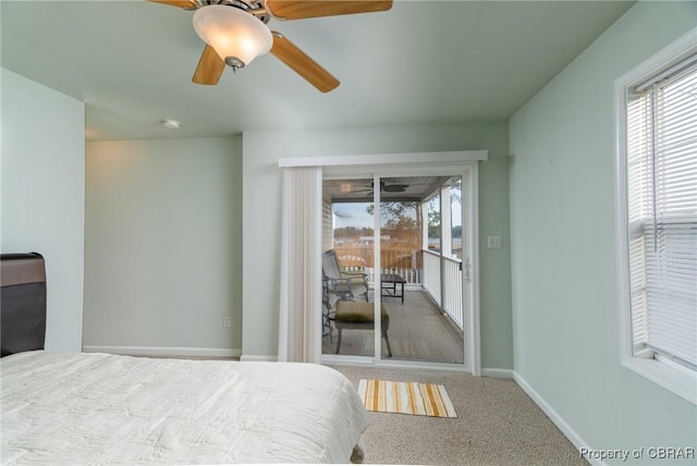 bedroom with ceiling fan, carpet floors, multiple windows, and access to exterior
