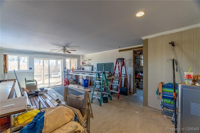 interior space with concrete floors and ceiling fan