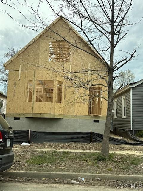 view of side of property featuring crawl space