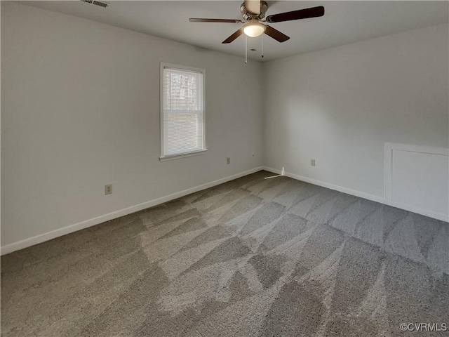 carpeted empty room with ceiling fan