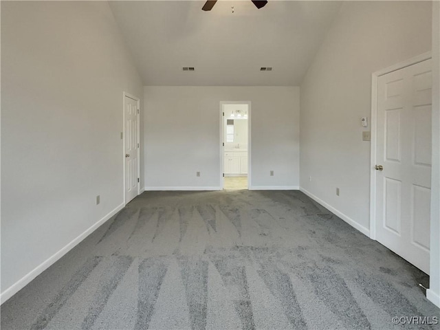 spare room featuring ceiling fan, high vaulted ceiling, and carpet floors