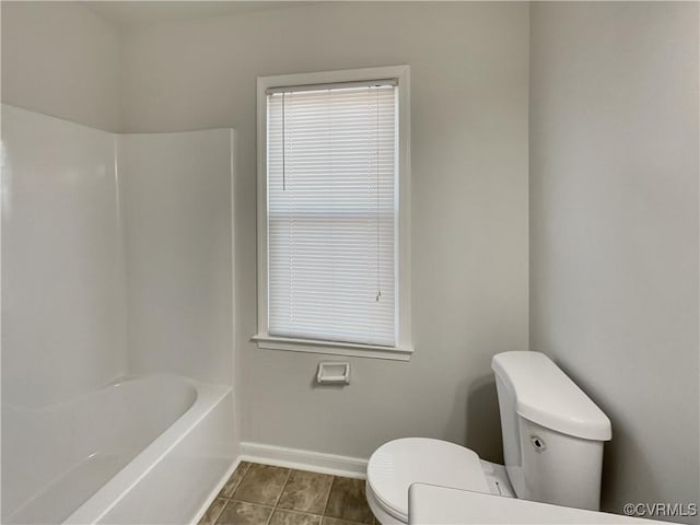 bathroom featuring tile patterned floors and toilet