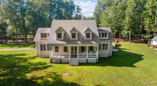 25 Cow Shed Rd, Lancaster, VA 22503 - rear view of house featuring a lawn, a deck, and view of scattered trees