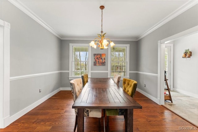 25 Cow Shed Rd, Lancaster, VA 22503 - dining area with a chandelier, ornamental molding, baseboards, and wood finished floors
