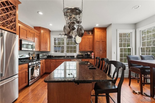 25 Cow Shed Rd, Lancaster, VA 22503 - kitchen featuring stainless steel appliances, a center island, light wood finished floors, a kitchen breakfast bar, and recessed lighting