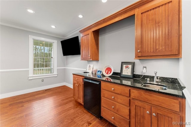 25 Cow Shed Rd, Lancaster, VA 22503 - kitchen with a sink, dark stone countertops, wood finished floors, black dishwasher, and recessed lighting