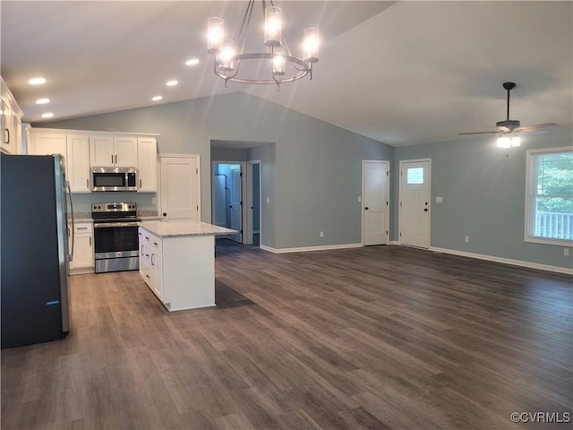 kitchen with decorative light fixtures, appliances with stainless steel finishes, dark hardwood / wood-style flooring, a kitchen island, and white cabinets