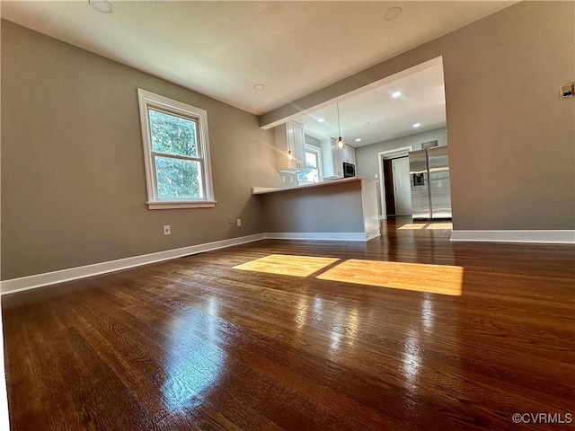 interior space with dark wood-type flooring