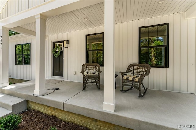 property entrance with covered porch