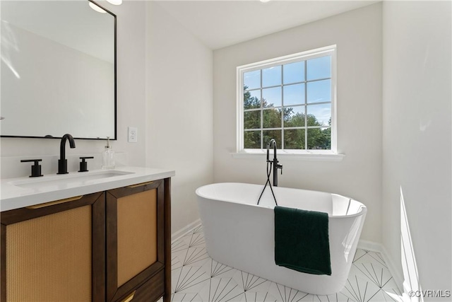 bathroom featuring a bathing tub and vanity