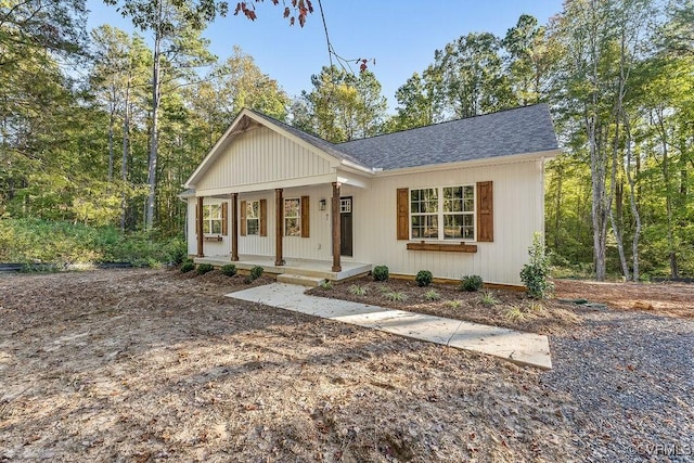 ranch-style home featuring a porch