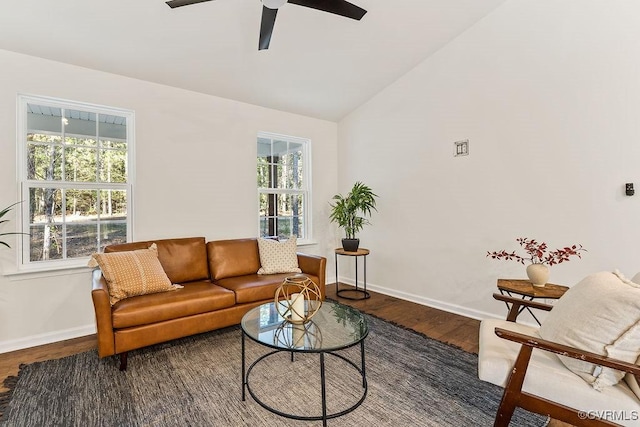 living room featuring hardwood / wood-style flooring, lofted ceiling, a healthy amount of sunlight, and ceiling fan