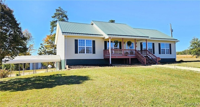 view of front of home featuring a carport, a porch, and a front yard