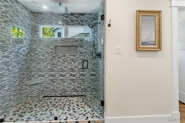 full bathroom with a shower stall