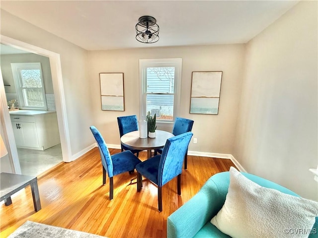 dining room with light wood-type flooring