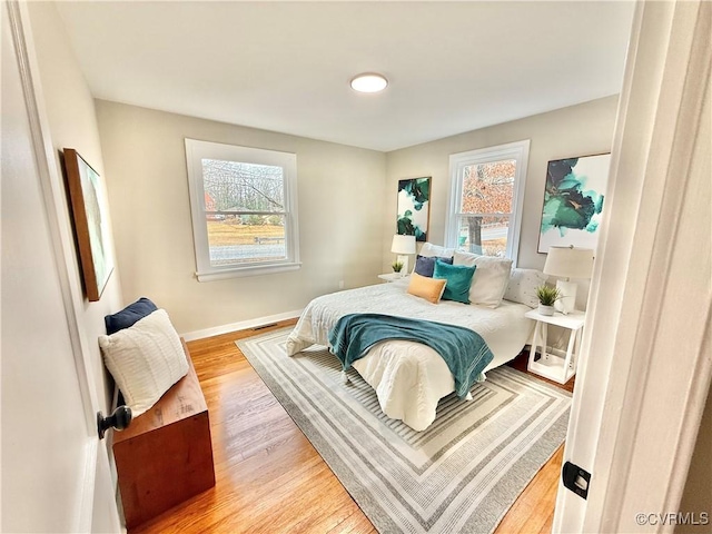 bedroom featuring wood-type flooring