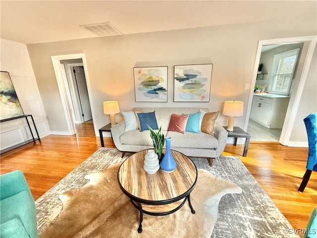 living room featuring wood-type flooring