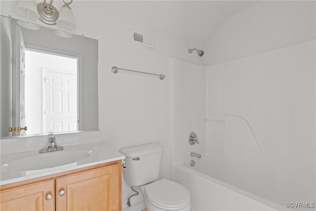 bathroom with shower / bathtub combination, toilet, vanity, visible vents, and vaulted ceiling