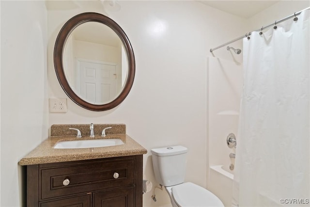 full bath with vanity, toilet, and shower / tub combo with curtain